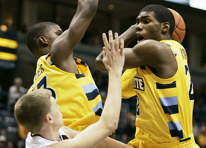 mumen19p13, mjs, news - Marquette's Jamail Jones tries to get a shot up in the
second half, in Milwaukee on Tuesday, December 14, 2010. PHOTO BY MARK...