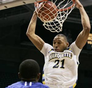 mumen08p5, mjs, news - Marquette's Joseph Fulce dunks the ball in the first half
against Texas A&M Corpus Christi, in Milwaukee on Tuesday, December 07, 2010....