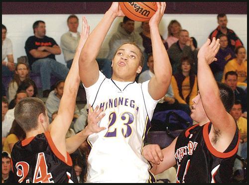 <I>Staff photo by Jim Franz</i><BR>David Brown (23) scored 17 points in...